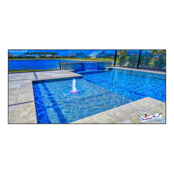 (Rennehan) FT MYERS FL Superior Pools Swimming Pool With Raised Wall & Waterfall