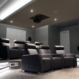 Example of a trendy home theater design in Montreal