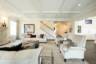 Inspiration for a transitional enclosed dark wood floor and brown floor living room remodel in Edmonton with beige walls, a standard fireplace and a tile fireplace