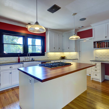 Delightful Contemporary Kitchen with Wood Island Top by DeVos Woodworking