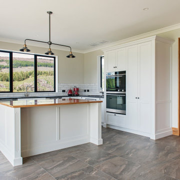 This bespoke kitchen as been designed and made by Paterson Joinery to give an ol