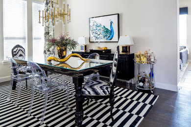 Enclosed dining room - contemporary dark wood floor and brown floor enclosed dining room idea in Austin with white walls