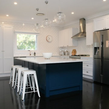 Hamptons style kitchen with corian benchtop