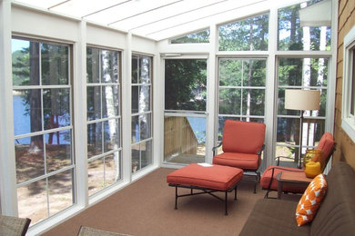 Example of a sunroom design in Other