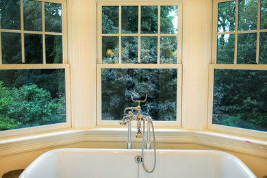 Mid-sized elegant freestanding bathtub photo in New York