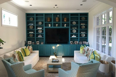 Example of a mid-sized trendy formal and enclosed dark wood floor and brown floor living room design in Houston with beige walls, no fireplace and a media wall