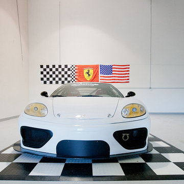 Cool Ferrari Garage with RaceDeck flooring  - Huge residential garage