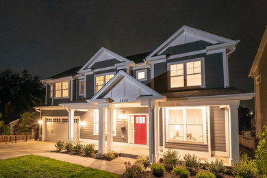 Inspiration for a large transitional blue three-story concrete fiberboard exterior home remodel in DC Metro with a shingle roof