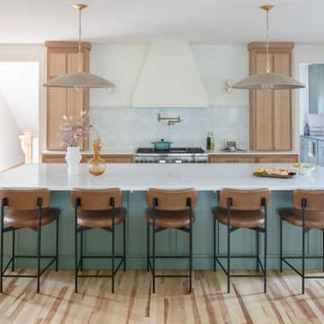 Warm Modern Kitchen Renovation with Natural Oak & Green Accents