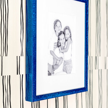 Close-Up of Blue Frames on Patterned Wallpaper