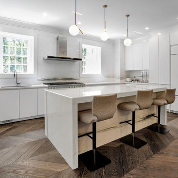 Modern White Kitchen Island with Wood Base & Bar Stools – Historic Renovation in