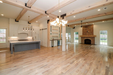 Example of a transitional living room design in Other