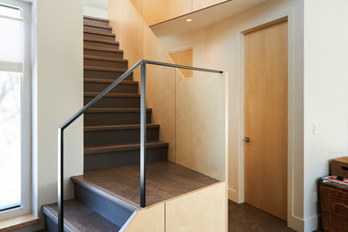 Mid-sized minimalist wooden straight wood railing staircase photo in Edmonton with wooden risers