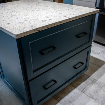 Two Tone Teal and Cream Kitchen with Romano White Quartz Countertop
