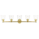 Livex Lighting - Catania 5-Light Polished Brass Large Vanity Sconce - The clean and simple Catania vanity sconce features a polished brass finish with hand blown clear glass. This sleek design will brighten up any bathroom.