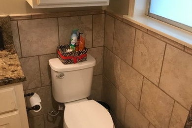 Elegant powder room photo in New Orleans