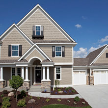 tan house black shutters