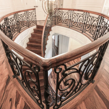 Project #74 | Circular Staircase with Hand-Forged Metal Panels