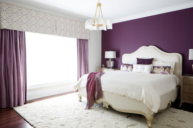 Example of a large transitional master dark wood floor and brown floor bedroom design in Toronto with purple walls