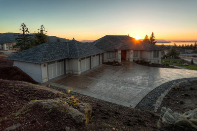 Example of a large minimalist two-story exterior home design in Seattle
