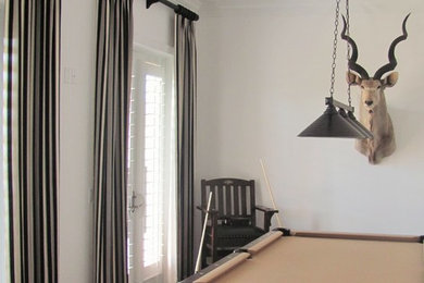 Family room - transitional family room idea in Miami
