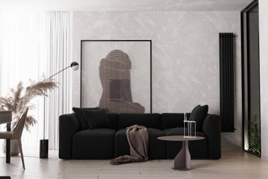 Imagen de salón cerrado moderno pequeño con paredes grises, suelo de madera clara, televisor colgado en la pared y suelo beige