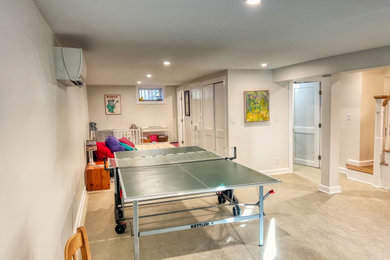 Large trendy basement photo in Boston