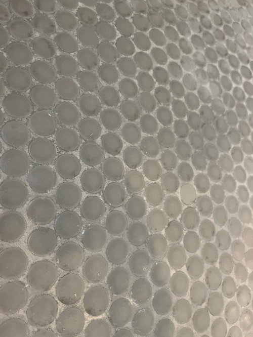 help. how do we fix this penny tile floor