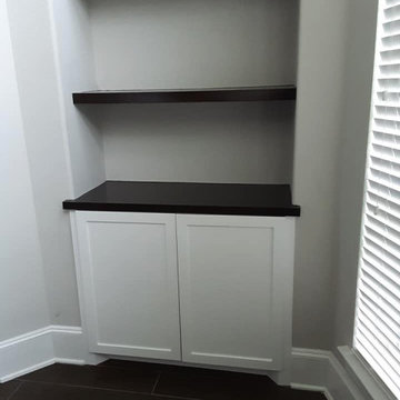Built-in White Cabient with Black Shelves