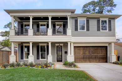 Example of a transitional home design design in Houston