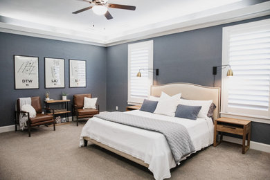 Bedroom - large transitional master carpeted and multicolored floor bedroom idea in Dallas with blue walls