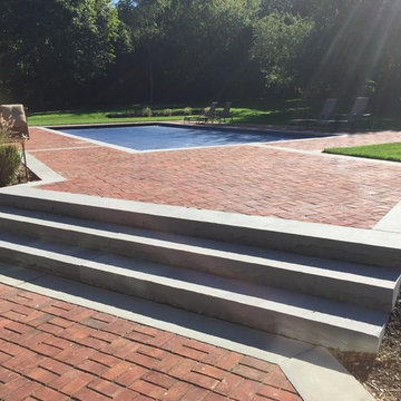 Traditional Brick Poolside Patio and Driveway
