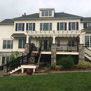 Zuri Deck with Cedar Pergola and Stone Fireplace with Grill