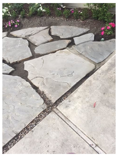 Garden pebbles vs dirt vs paver cement