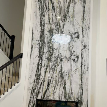 Dramatic Full-Height Slab Fireplace