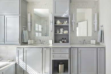Mid-sized transitional master white tile and porcelain tile porcelain tile drop-in bathtub photo in Atlanta with an undermount sink, recessed-panel cabinets, gray cabinets, quartz countertops and white walls