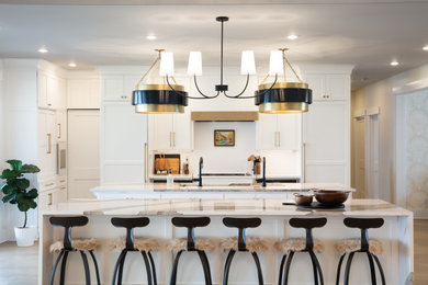 Large transitional eat-in kitchen photo in Other with white cabinets, quartz countertops, white backsplash, quartz backsplash, paneled appliances, two islands, white countertops and shaker cabinets
