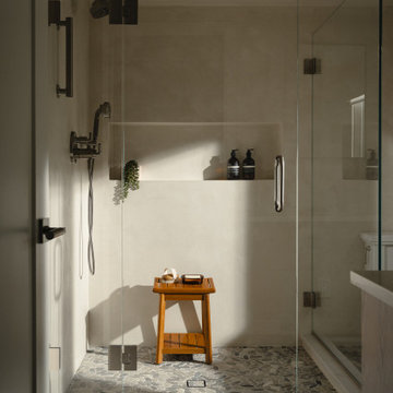 Spa Shower with Pebble-Tile Floor & Teak Bench