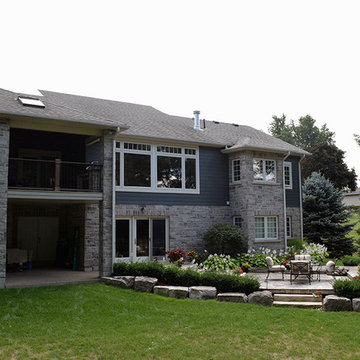 A stone deck built on steel substructure and a covered porch deck in Veka vinyl.