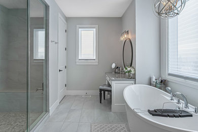 Example of a mid-sized arts and crafts master double-sink bathroom design in Calgary with a built-in vanity