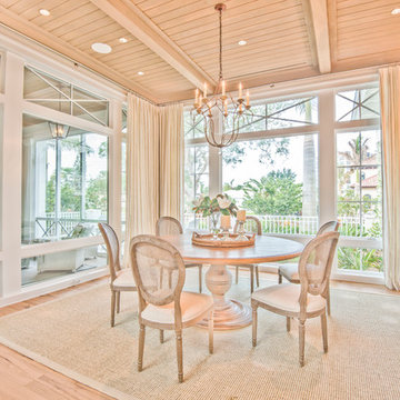 Elegant dining with floor to ceiling windows