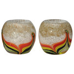 Dale Tiffany - Crown PointArt Glass Candle Holder, 2-Piece Set - The fiery colors and varied textures of our 2 Piece Crown Point Candle Holder Set is a bold expression of your good taste. Each votive holder features a background of mottled gold and light amber at the top. Warm flames of red, yellow, orange and amber stripes flicker about the entire surface. Hand blown of Favrile art glass, each piece is a unique individual�no 2 pieces are exactly alike. A bold addition to any room, our 2 Piece Crown Point Candle Holder Set is a stunning gift for yourself or someone special who appreciates quality design and workmanship.
