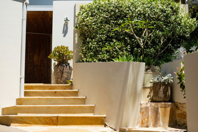 Inspiration for a mid-sized beach style entryway in Sydney.