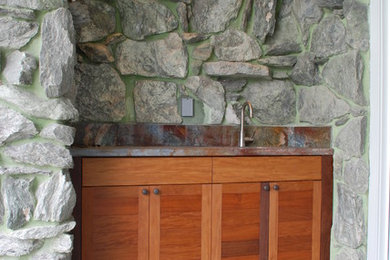 Example of an arts and crafts patio design in Miami