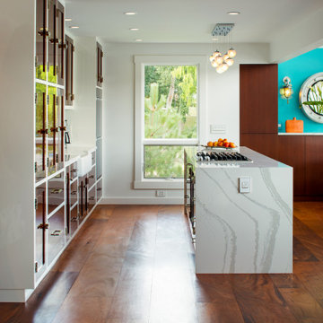 Kitchen is expanded with the addition of a window