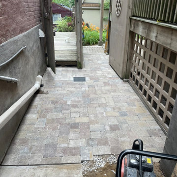 New hardscape stone paver pathway with drain installation