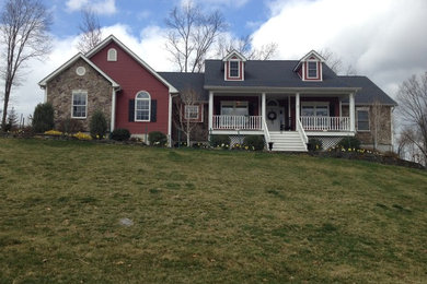 Mid-sized red one-story mixed siding exterior home idea in Salt Lake City with a hip roof