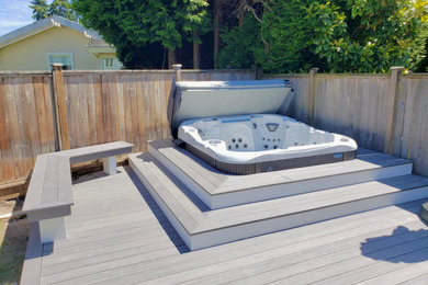 Deck - mid-sized backyard deck idea in Vancouver