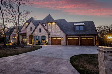 Inspiration for a large modern multicolored one-story house exterior remodel in Dallas with a hip roof, a shingle roof and a gray roof
