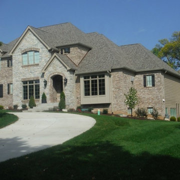 Khaki Brown Lap Siding | Pebblestone Clay Aluminum Soffit & Fascia | Ladue, MO.